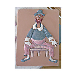 Klaun - motiv Fr. Tichý. Částečně glazovaný kachel